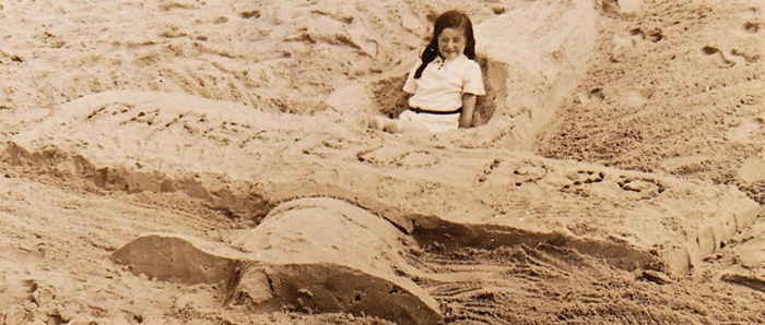 Joy in sand castle